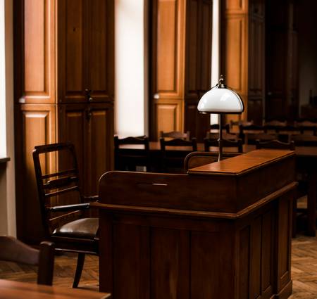 A grieving family in a lawyer's office discussing options for a wrongful death lawsuit