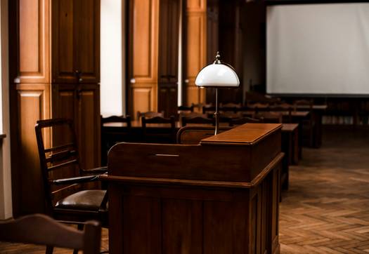 Attorney reviewing premises liability evidence with injured client